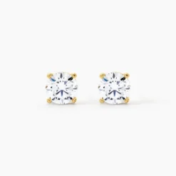 Boucles D'oreilles Puces Phebus Him Acier Doré Oxyde De Zirconium